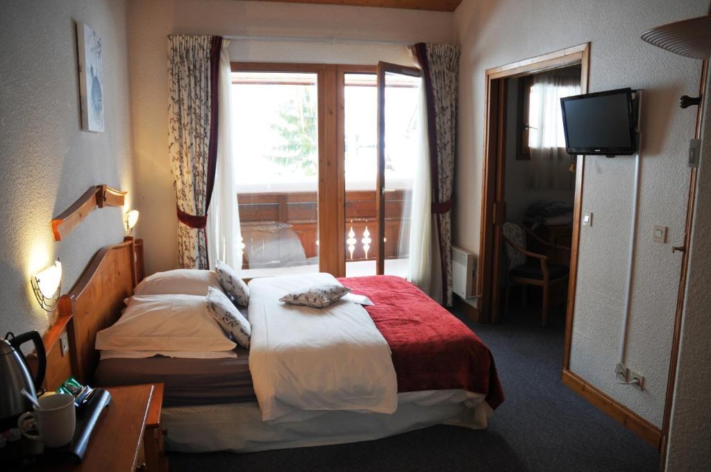 Hotel Le Calgary Les Saisies Habitación foto